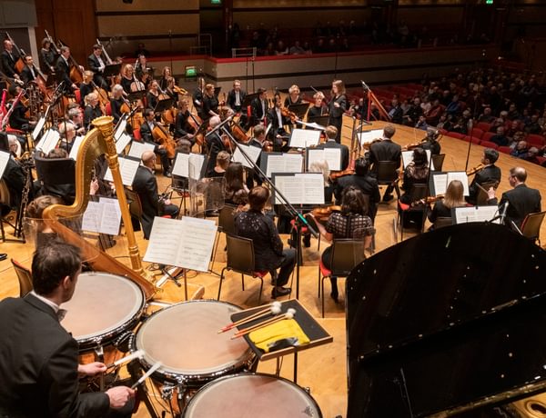 Photograph of the Orchestra on-stage.