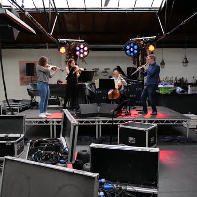 Photograph of a quartet rehearsing at Hockley Social Club