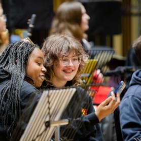 Photograph of two teenage girls taking a selfie together