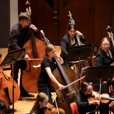 young musicians playing the double bass