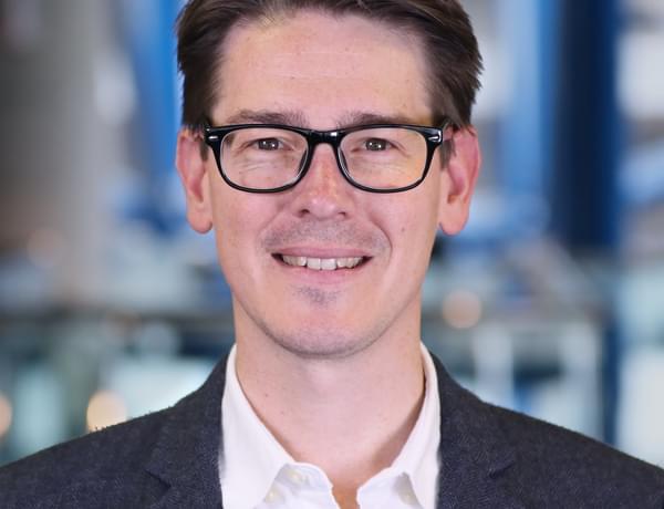 Headshot of double bassist Jeremy Watt