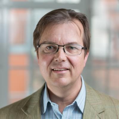 Headshot of Charles Barwell OBE