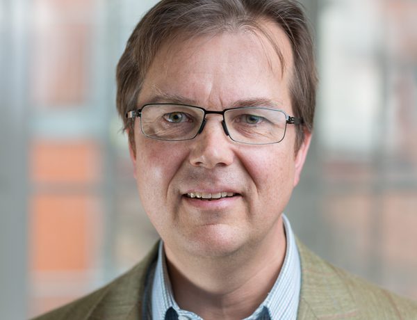 Headshot of Charles Barwell OBE