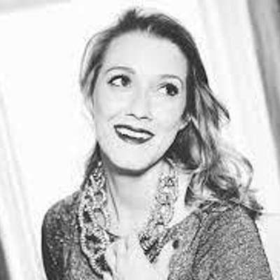 Photograph of Alice Fearn smiling.