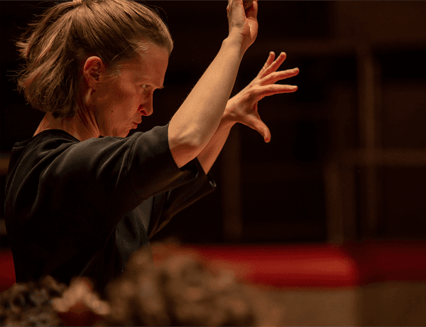 Photograph of Mirga Gražinytė-Tyla conducting the CBSO.